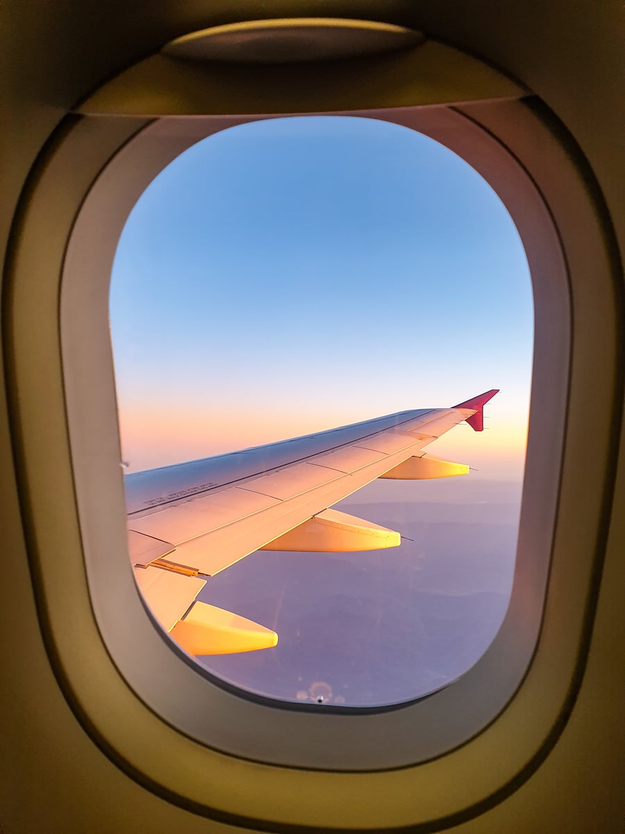 airplane wing view from window in midflight during