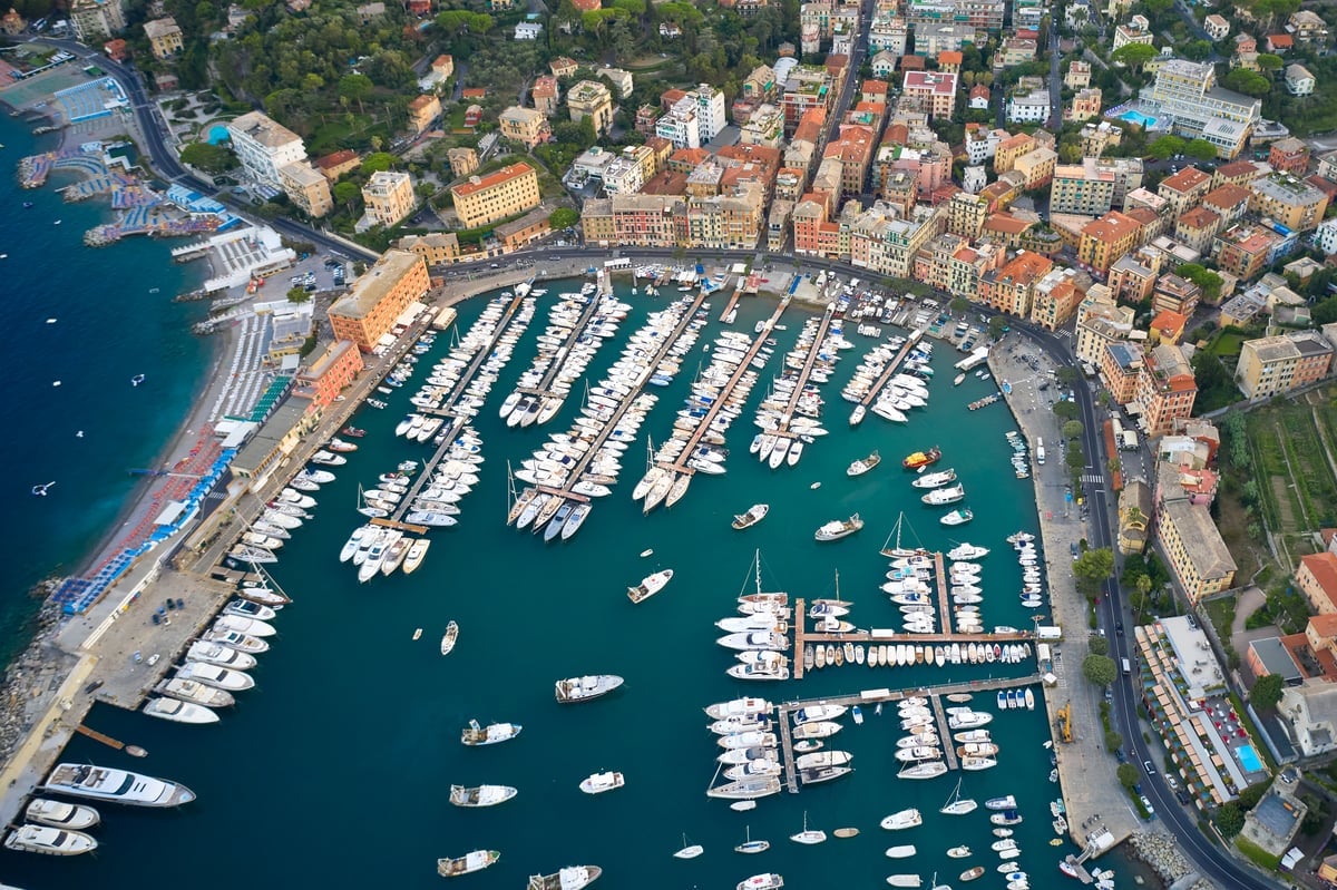 top view on a harbor with moored sea ships yachts