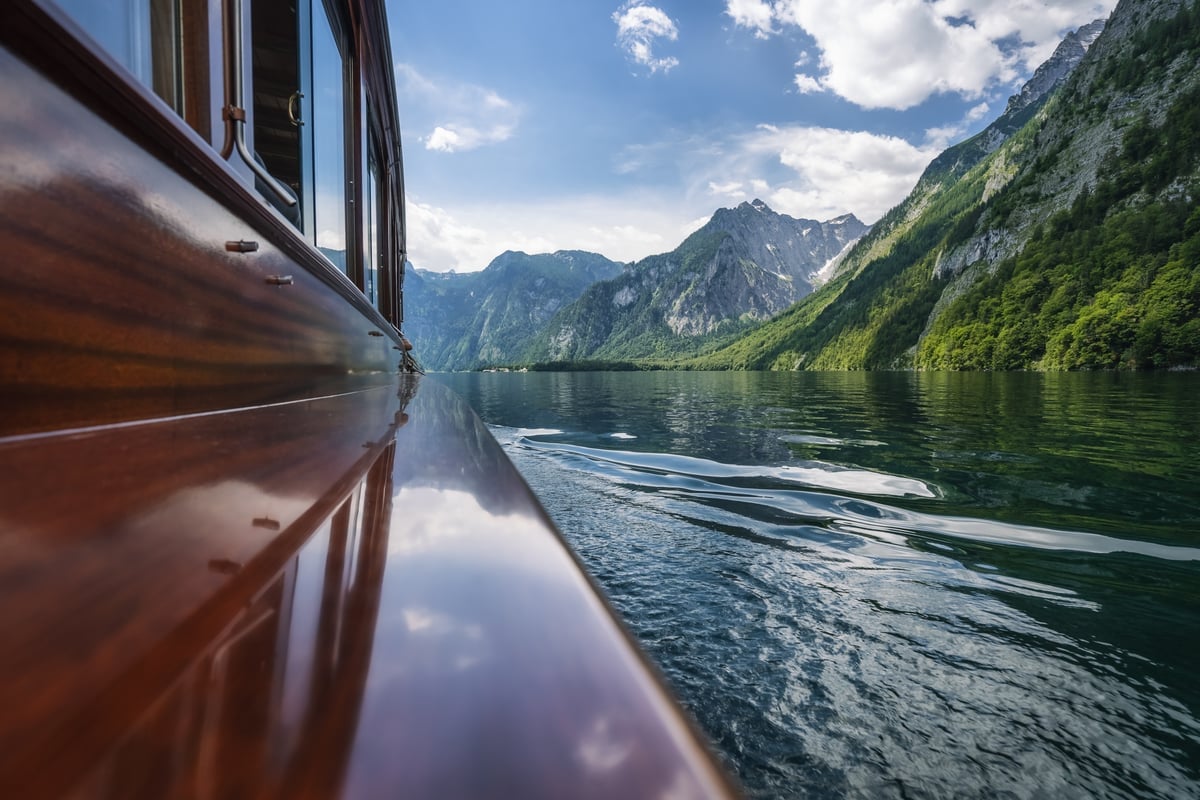 view from a sailing boat at lake koenigssee in bav